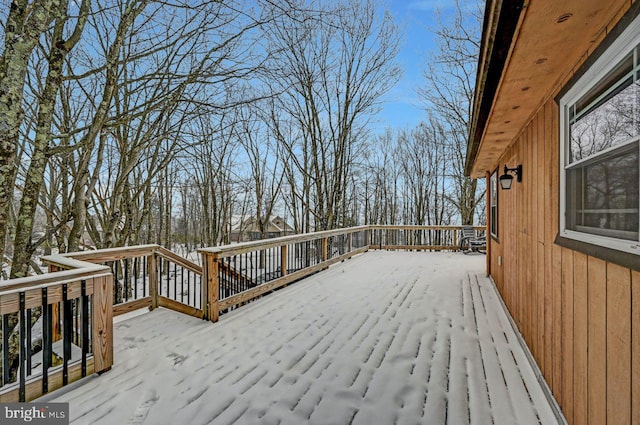 view of snow covered deck