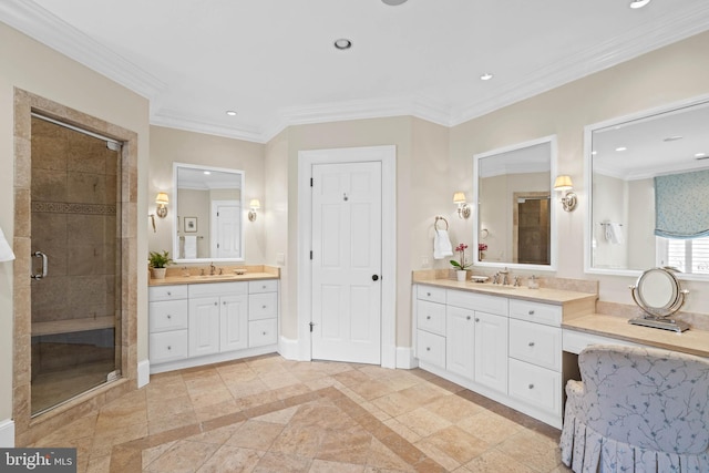 bathroom featuring vanity, crown molding, and a shower with shower door