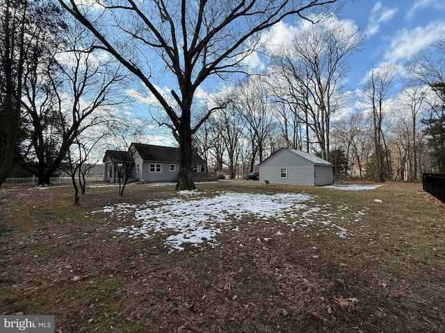 view of yard layered in snow