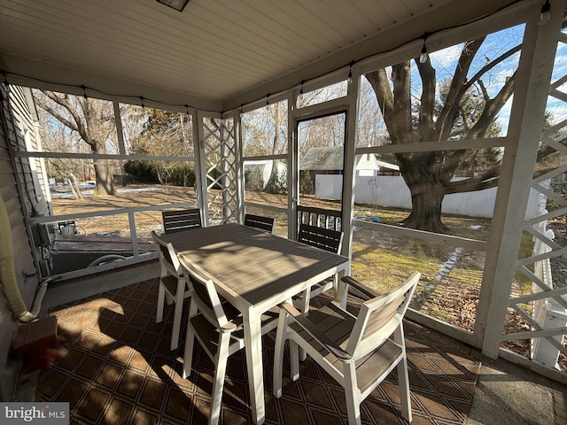 sunroom / solarium featuring a wealth of natural light