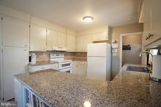 kitchen with sink, light stone counters, white cabinetry, white appliances, and backsplash