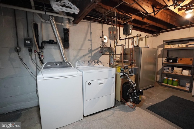 washroom featuring washer and clothes dryer