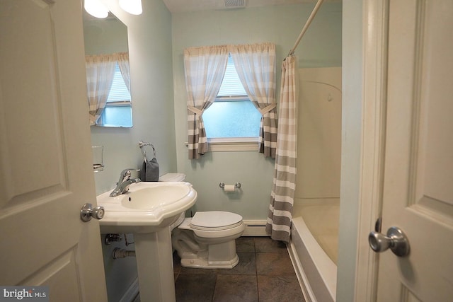 bathroom with shower / bath combination with curtain, baseboard heating, and toilet