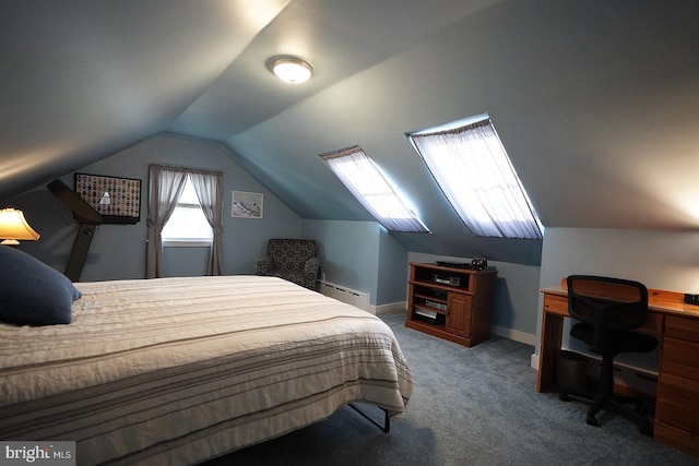 bedroom with vaulted ceiling, baseboard heating, and carpet flooring