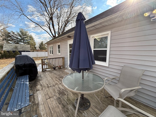 wooden terrace with grilling area