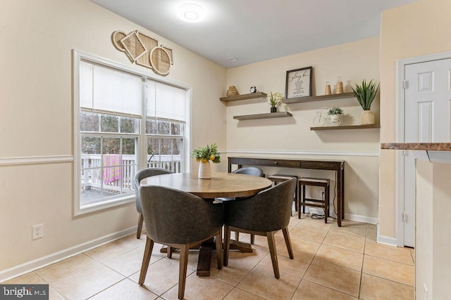 view of tiled dining space