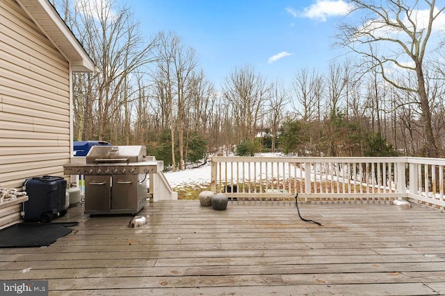 wooden terrace with area for grilling