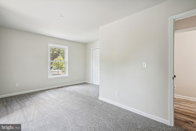 spare room with carpet floors