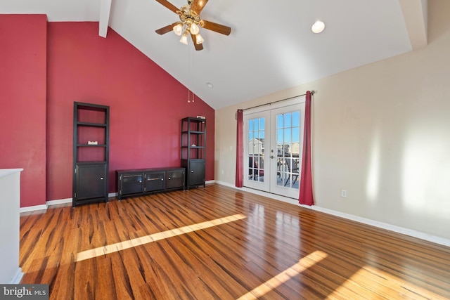 unfurnished living room with ceiling fan, french doors, wood-type flooring, and beam ceiling