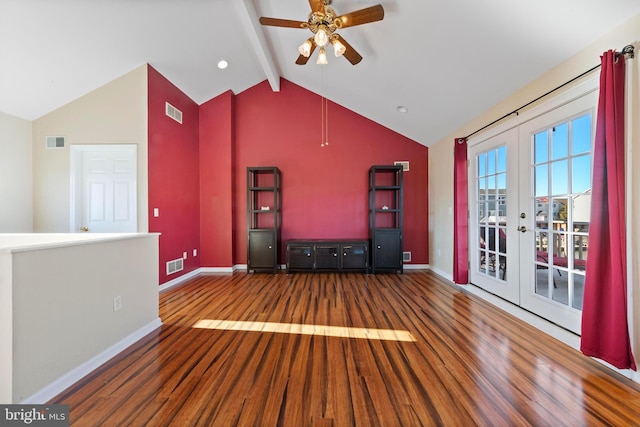 unfurnished living room featuring ceiling fan, french doors, dark hardwood / wood-style flooring, and vaulted ceiling with beams