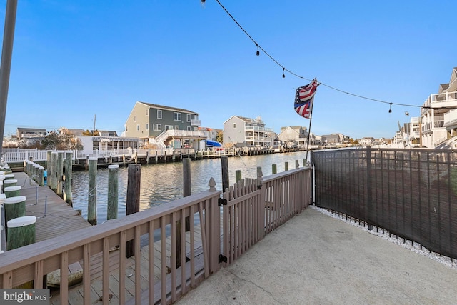 view of dock with a water view