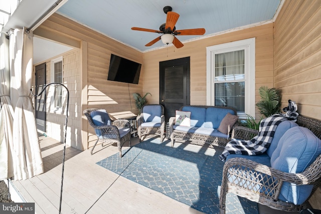 view of patio featuring ceiling fan and outdoor lounge area