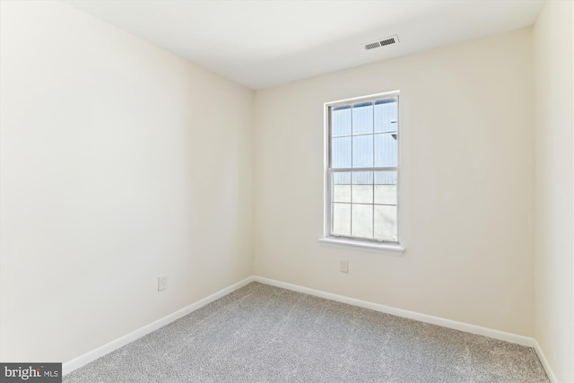 view of carpeted spare room