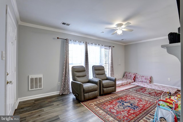 living room with ceiling fan, crown molding, and dark hardwood / wood-style flooring