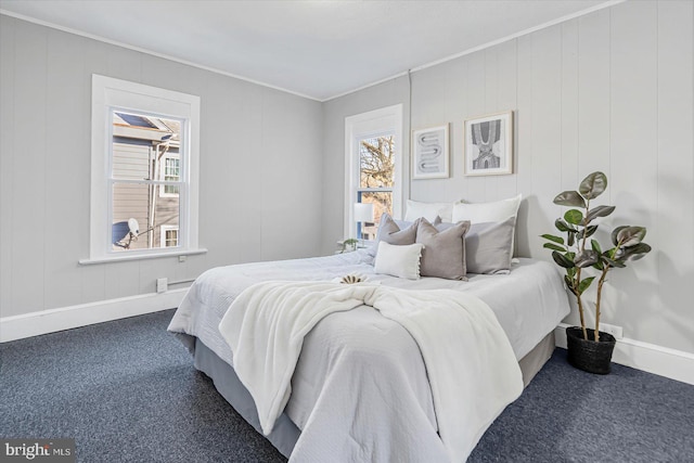 carpeted bedroom with ornamental molding