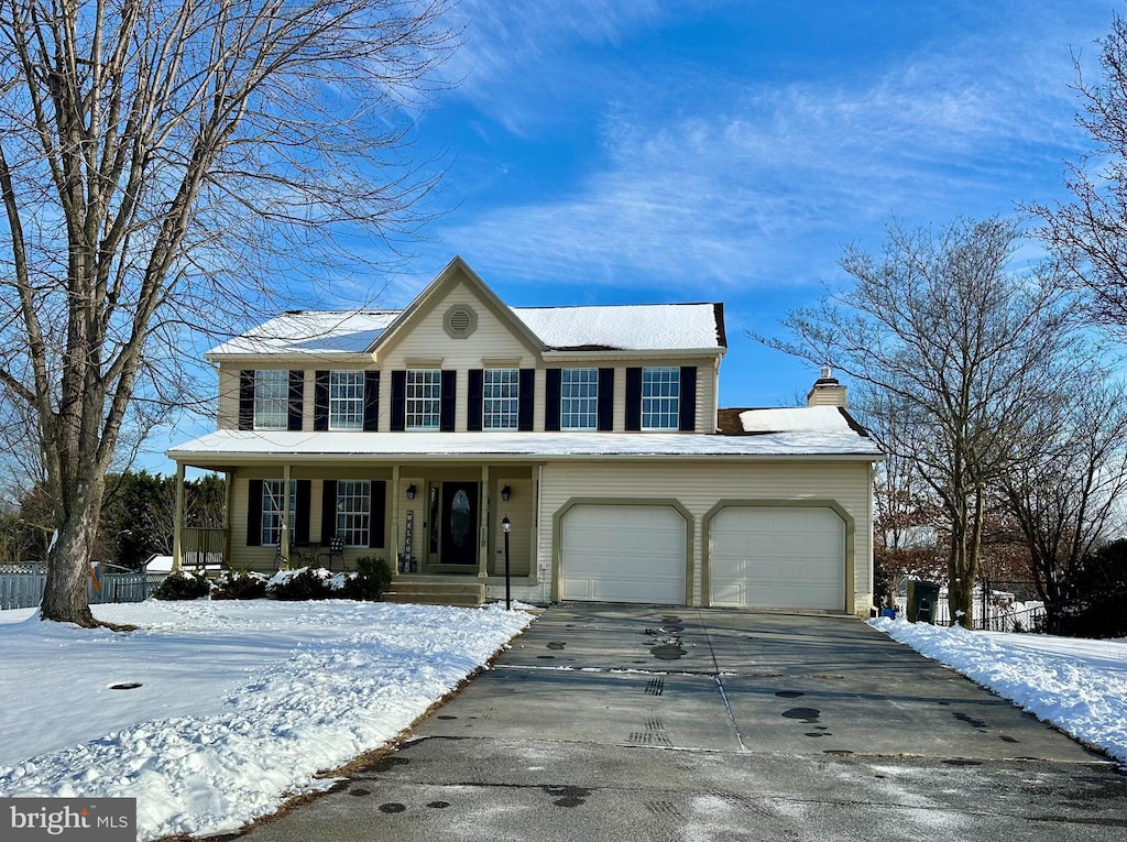 colonial home with a porch