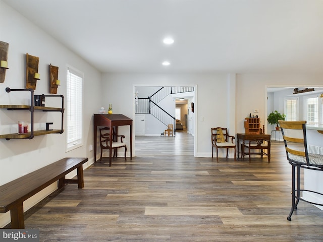 interior space with dark hardwood / wood-style floors and plenty of natural light