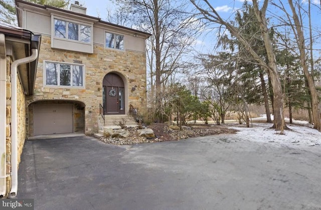 view of front of home with a garage