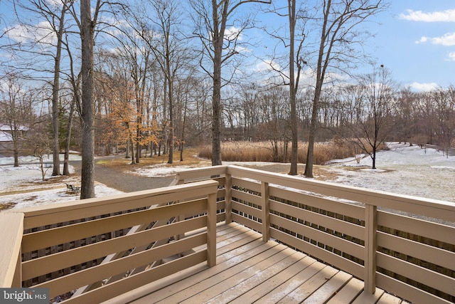 view of snow covered deck