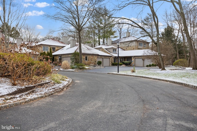 exterior space with a garage