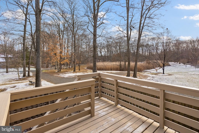 view of snow covered deck