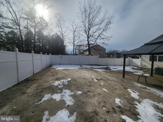 view of yard with a gazebo and central air condition unit