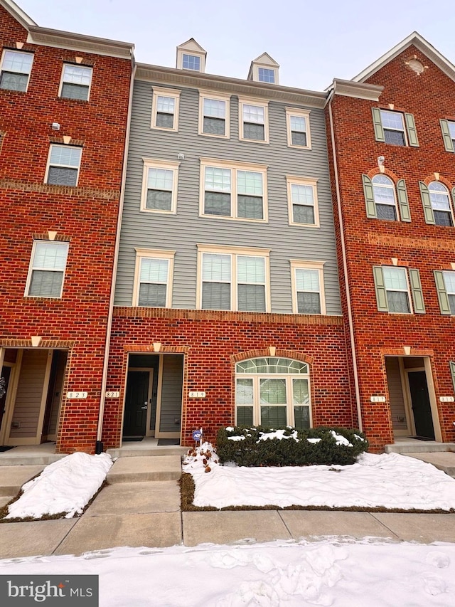 view of snow covered building