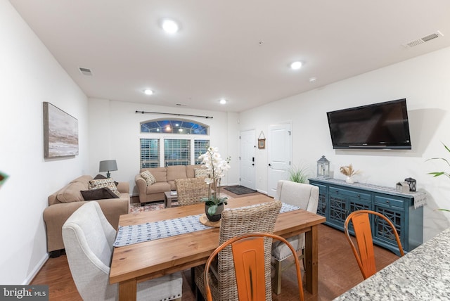 dining room with hardwood / wood-style floors