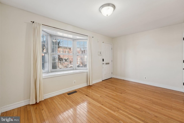 empty room featuring light hardwood / wood-style flooring