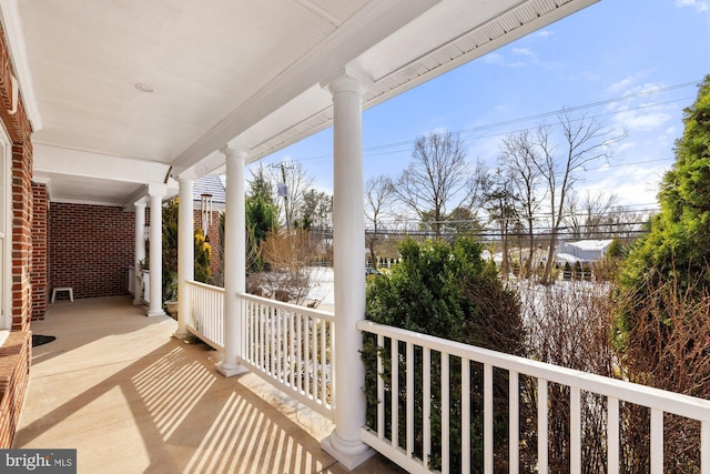 balcony featuring covered porch