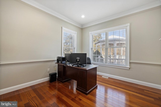 home office with crown molding and dark hardwood / wood-style flooring