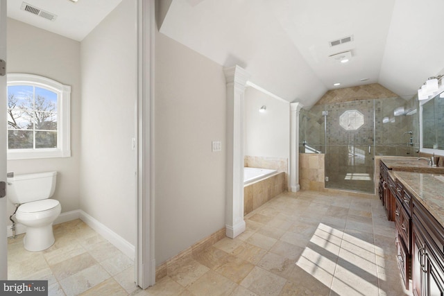 full bathroom featuring vanity, vaulted ceiling, independent shower and bath, and toilet