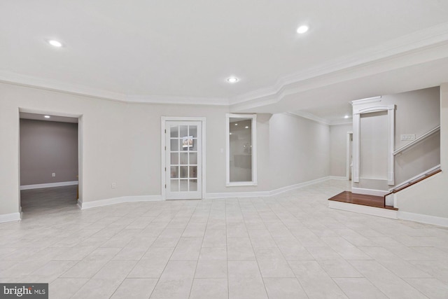 unfurnished living room with crown molding