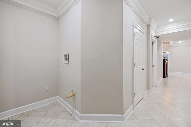 hallway featuring ornamental molding and light tile patterned floors