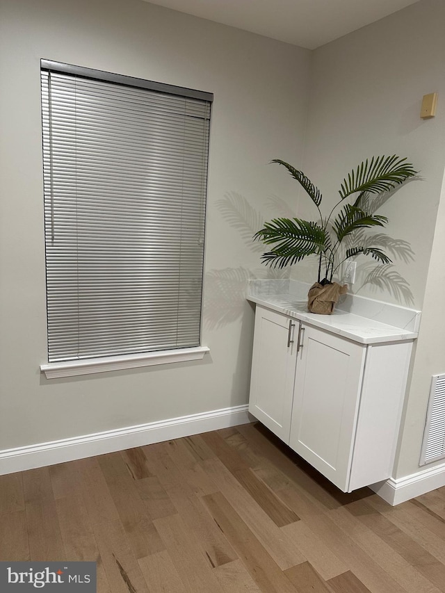 room details featuring hardwood / wood-style floors