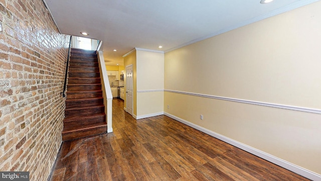 unfurnished room with dark hardwood / wood-style flooring and crown molding