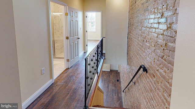 hallway featuring dark hardwood / wood-style floors