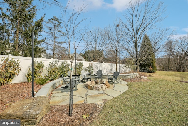 view of yard featuring fence private yard and a patio area