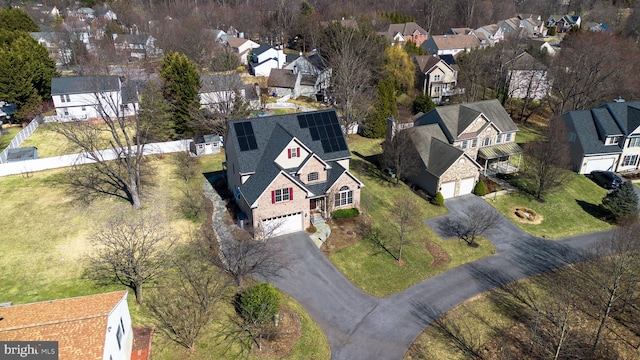 drone / aerial view with a residential view