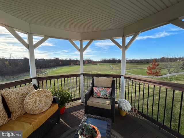 wooden deck with a yard