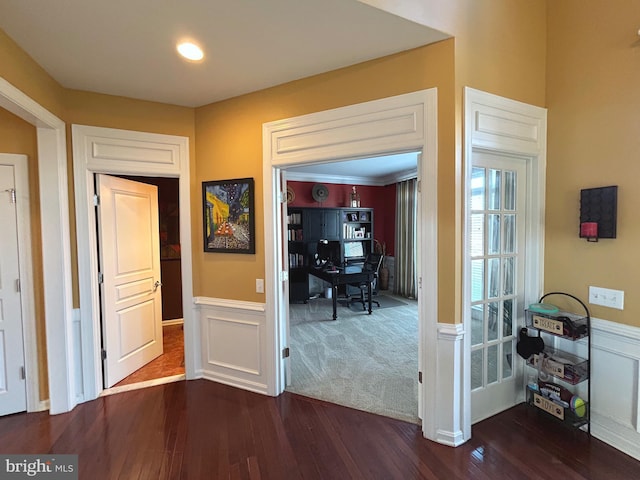 corridor featuring hardwood / wood-style flooring