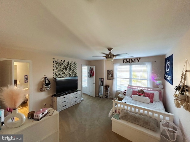 carpeted bedroom featuring ceiling fan