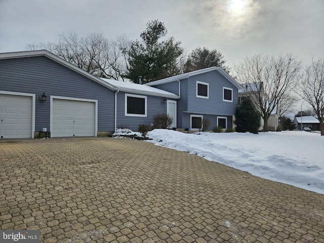 split level home featuring a garage