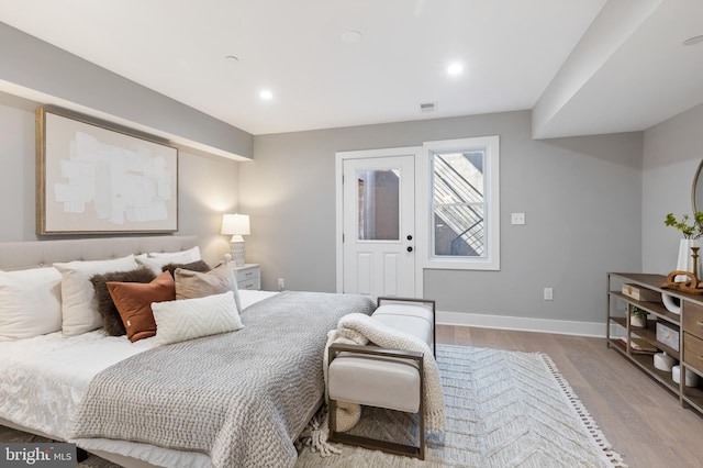 bedroom featuring light hardwood / wood-style floors