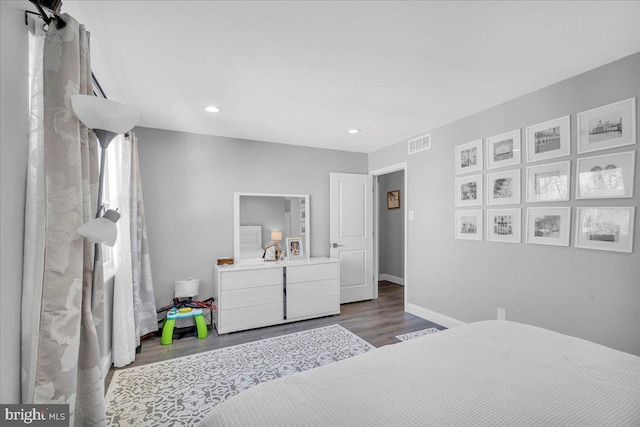 bedroom featuring dark wood-type flooring