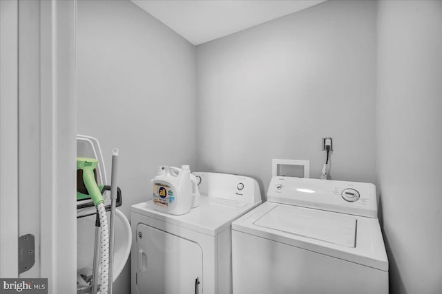 laundry area featuring independent washer and dryer