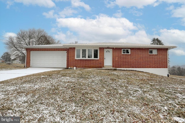 ranch-style house featuring a garage