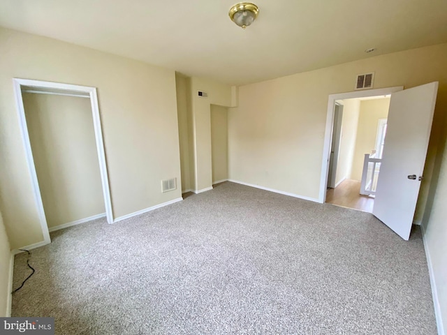 unfurnished bedroom featuring carpet flooring