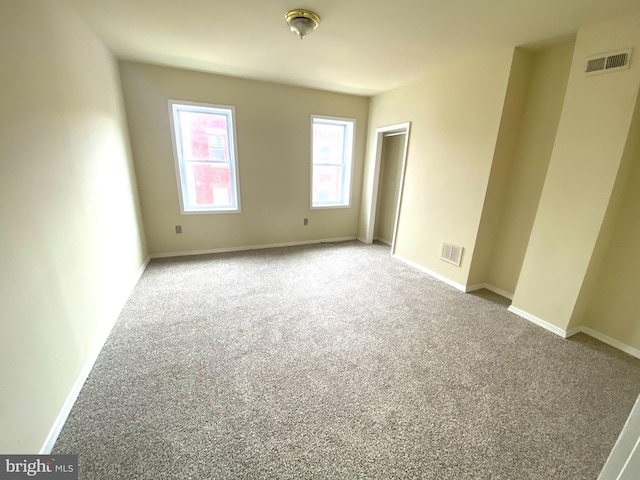 empty room with light carpet