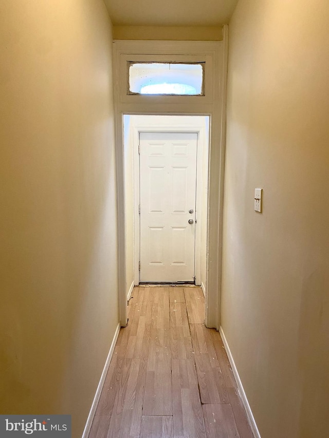 entryway with light hardwood / wood-style floors